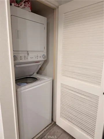 Laundry closet inside the home, washer/dryer included.