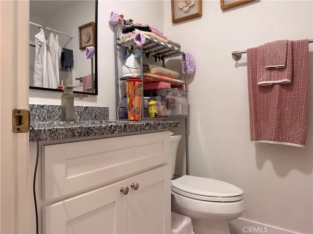 Hall bath for guests and secondary bedroom.