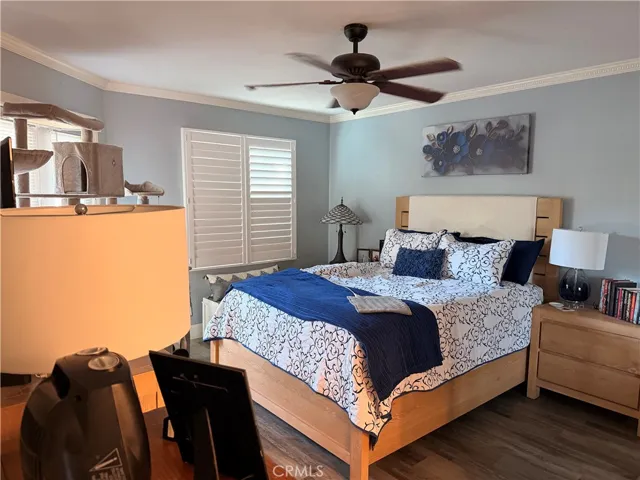 Primary bedroom with en-suite bathroom and door to large, private, patio.