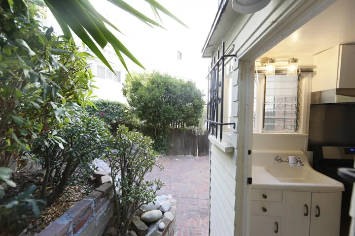 Rec Room back door looking out on private brick patio