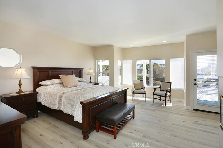 Primary bedroom with patio access