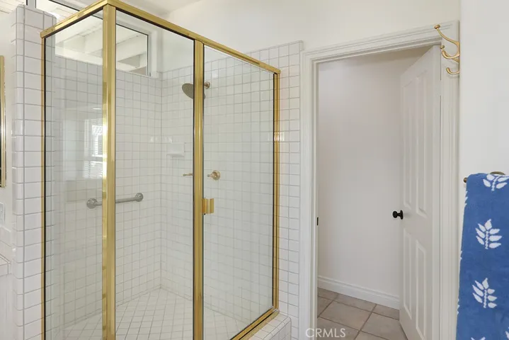 Primary bedroom shower and toilet closet