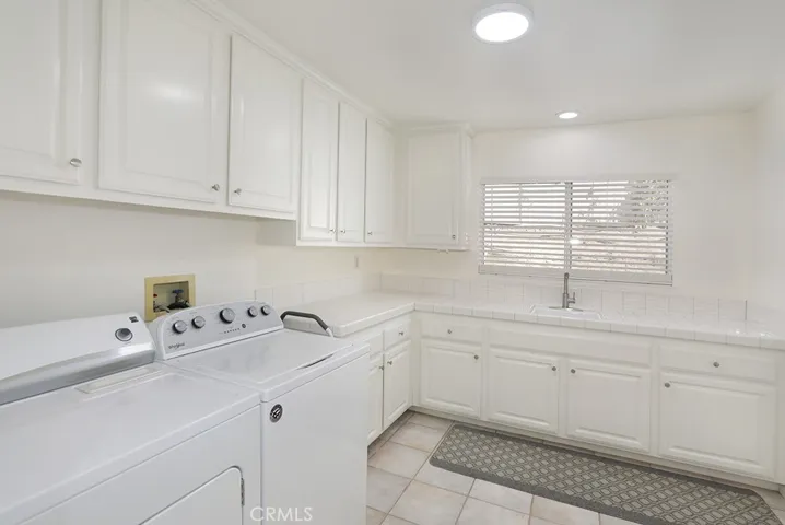 Huge dedicated laundry room on lower level