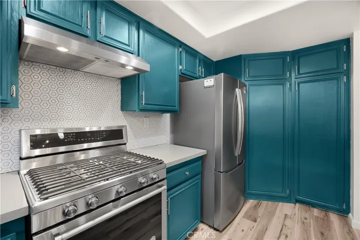 Range, Pantry and plentiful cabinetry