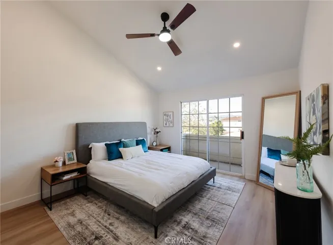 Primary bedroom suite with balcony