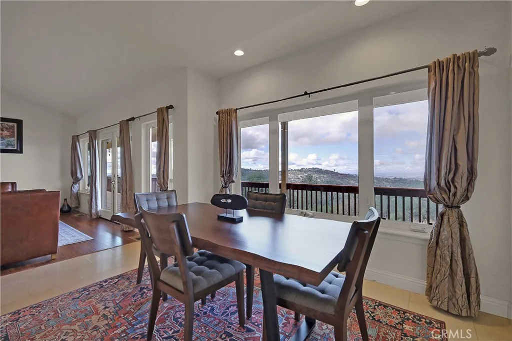 Dining space with gorgeous views and windows.