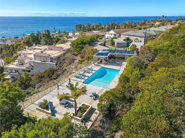 Association pool and lounge area with ocean views.