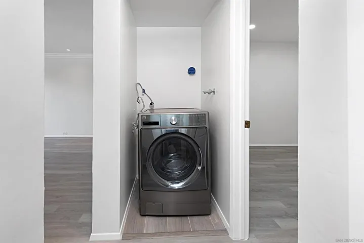 LAUNDRY CLOSET BETWEEN LIVING ROOM & GUEST BEDROOM