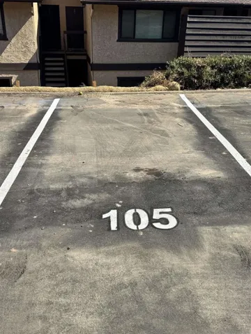 UNCOVERED ASSIGNED 2ND PARKING SPOT #105