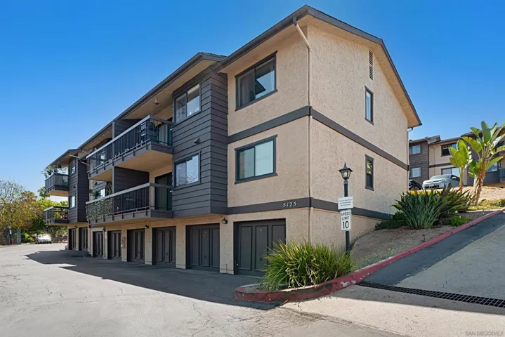 EXTERIOR FRONT FRO LOWER RIGHT SIDE NEAR GARAGE