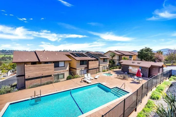 COMMUNITY POOL, JACUZZI, AND BATHROOM