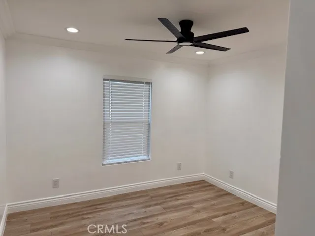 Bedroom /new lighting, mirrored closet doors and remote ceiling fan