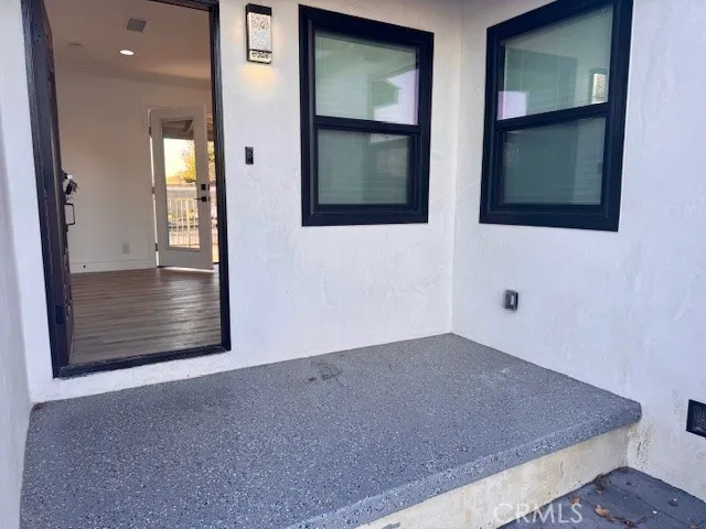 Front Entry, new concrete, doors, windows