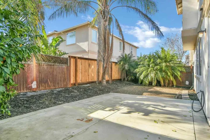 Fenced backyard featuring a patio area