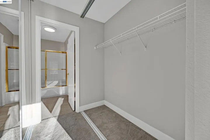 Primary Bedroom Closet - Closet Doors on Order