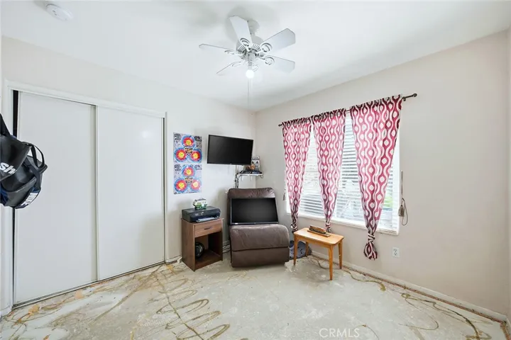 Downstairs Bedroom - concrete floor