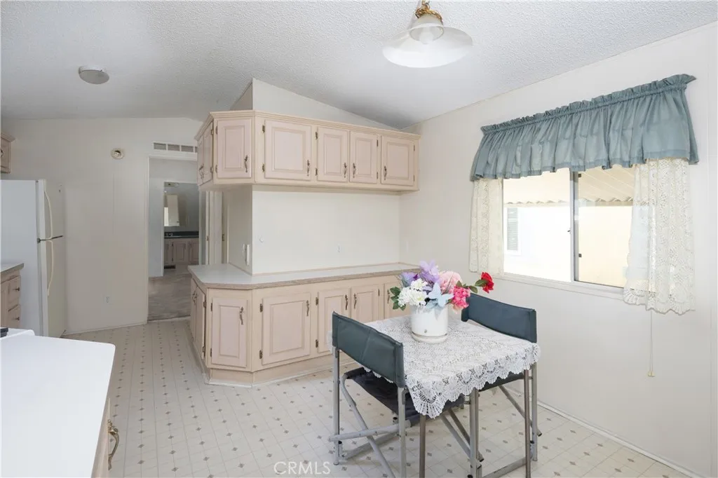 Notice the extra storage about the kitchen eating area.