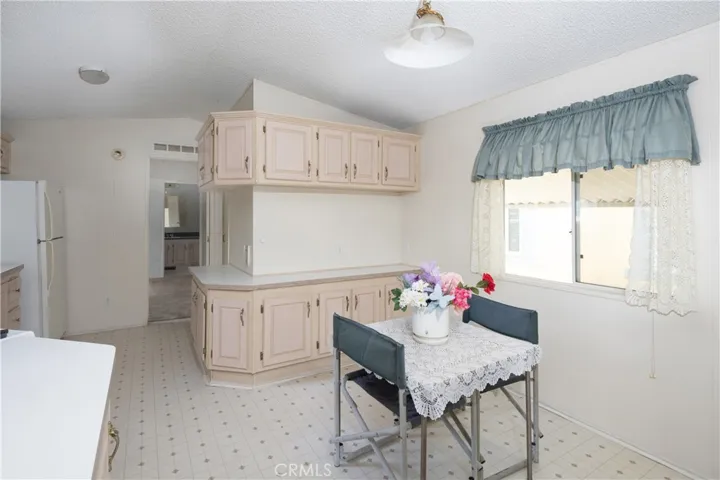 Notice the extra storage about the kitchen eating area.