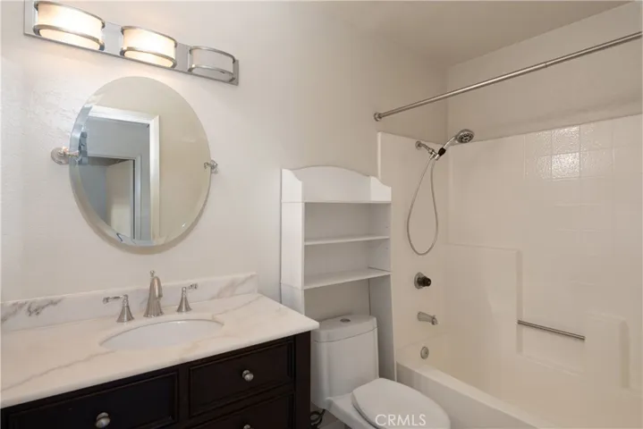 Second bedroom bathroom off the hallway right next to the second bedroom.