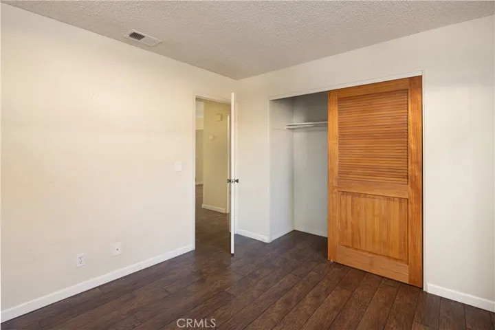 Well kept laminate floors in the second bedroom