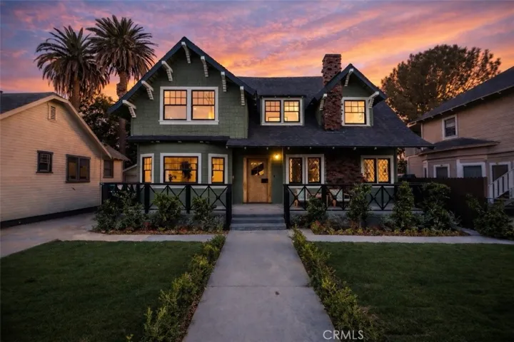Twilight of this 1907 craftsman in Historic Neighborhood.