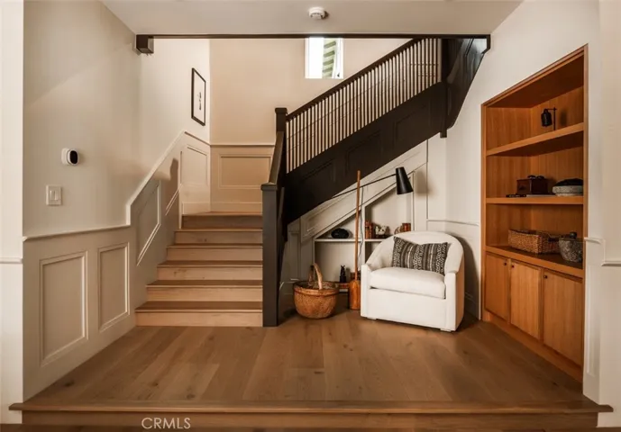 Original 1907 handrail, with hidden storage underneath the stairs.