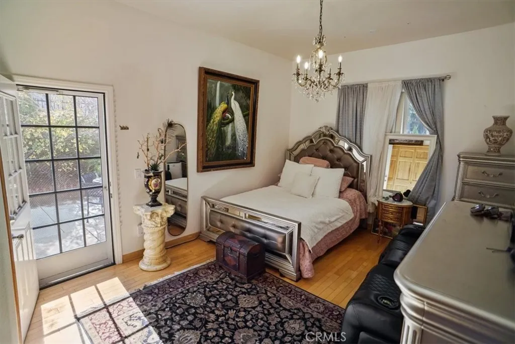 Downstairs Bedroom with Private Patio