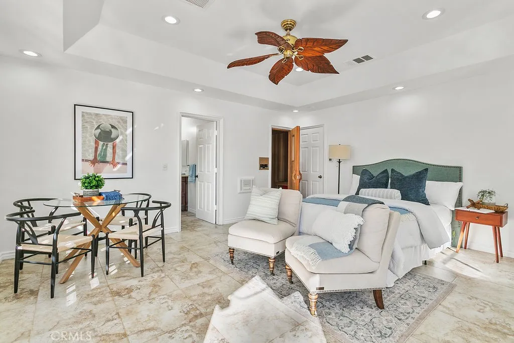 Wow! a fully separate permitted pool house with full bath, a SAUNA and a kitchenette>