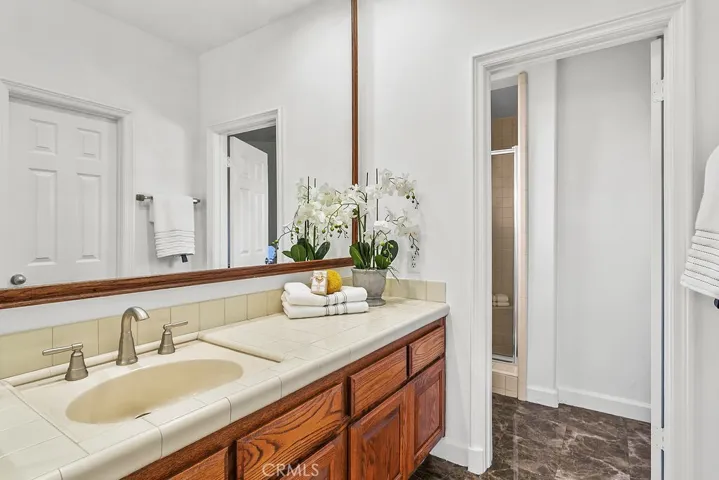 Secondary  upstairs bathroom with walkin shower.
