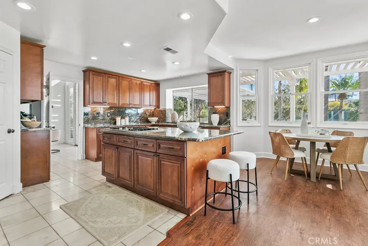 Kitchen with island and breakfast area cove.