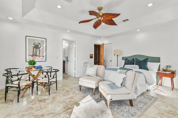 Wow! a fully separate permitted pool house with full bath, a SAUNA and a kitchenette>