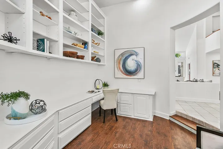 Office is just off the front entry.  Maybe a leaded glass door could add art or color as well as more seclusion.