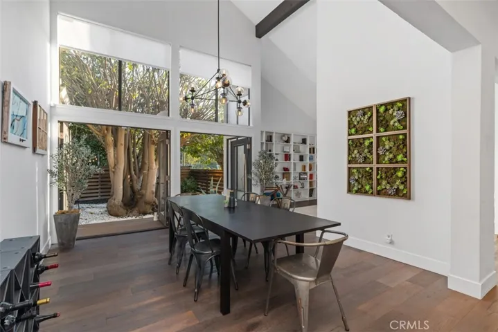Dining room with Vaulted Ceilings and Double French doors