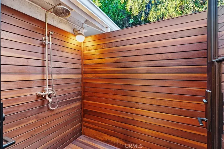 Exterior shower for rinsing pre or post swim.