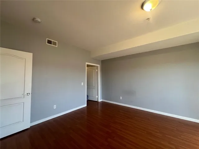 Spacious bedroom with a walk in closet