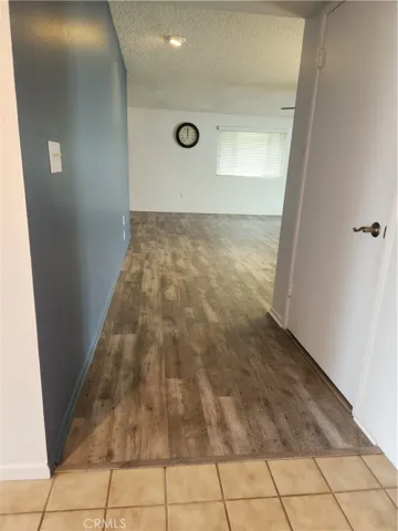 Hallway from entry area toward huge liv/bonus rm combo