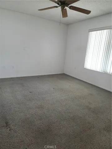 Master bdrm with ceiling fan