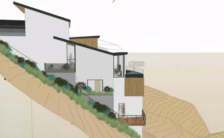 View of side of property featuring stucco siding