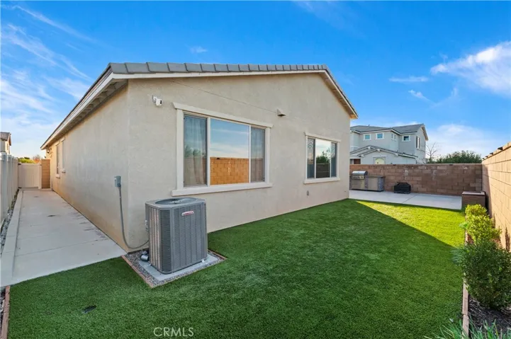 Fully Landscaped with Turf, Concrete, Irrigation, & French Drains.