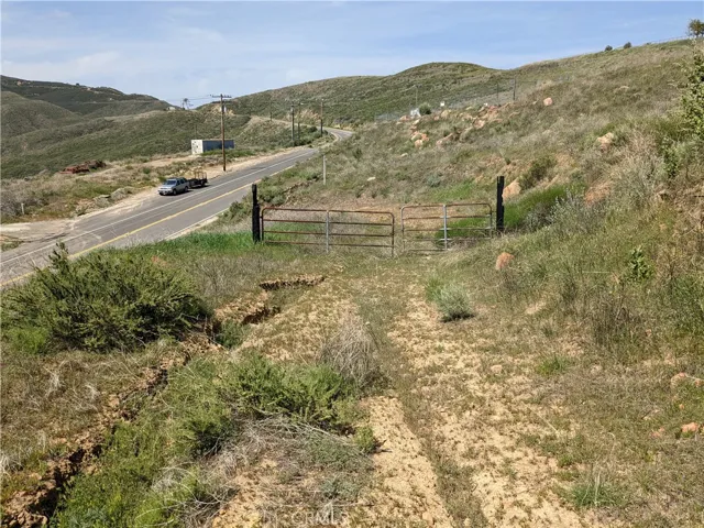 Reference Only(not property) - Take dirt trail up to get to the property.
