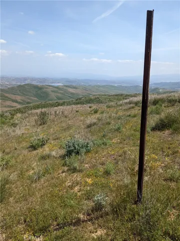 Northwest property corner may be indicated by this pole.