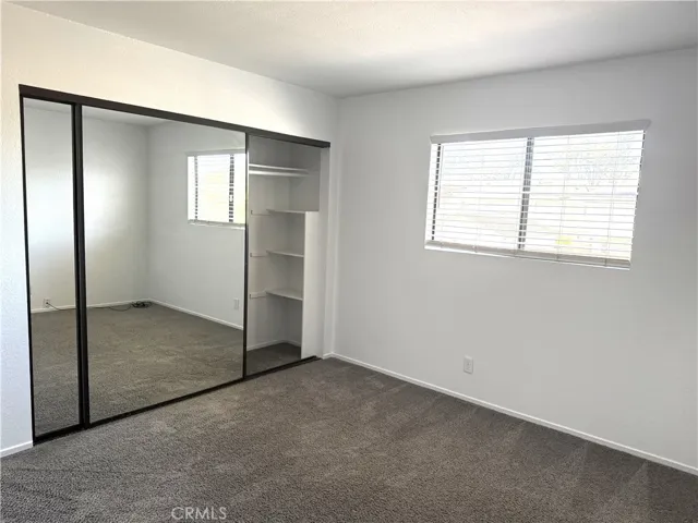 1st Bedroom w/Mirrored Closet Doors