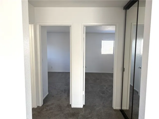 Hallway leading to separate bedrooms