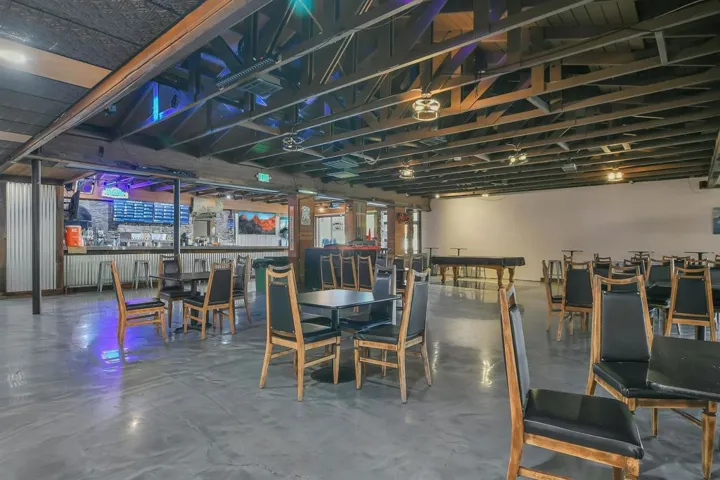 Dining area featuring concrete flooring