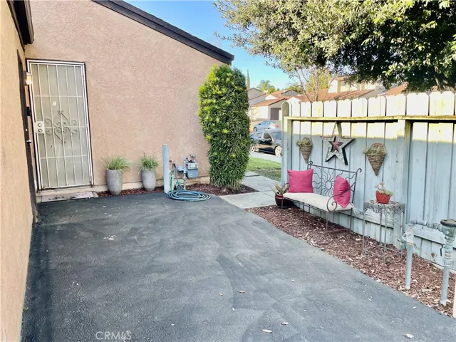 PARKING BY GARAGE AND SIDE ENTRANCE