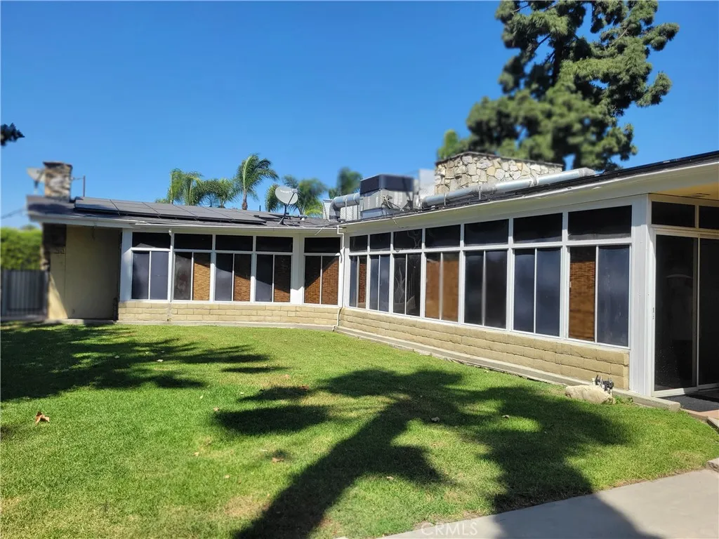 Enclosed patio viewed from backyard