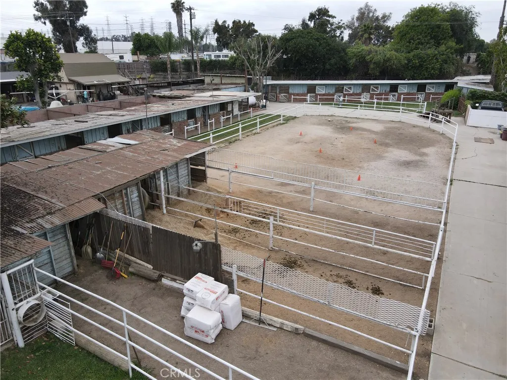 Multiple stable buildings & arena from drone