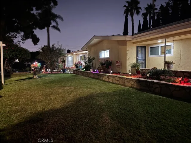 View as you enter north driveway at night