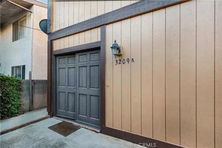 Entry to upper, remodeled 3 bedroom unit