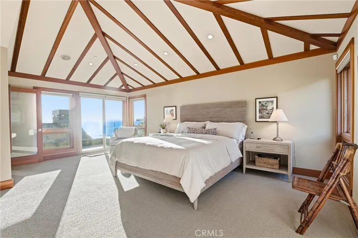 Primary Bedroom with balcony and ocean views!